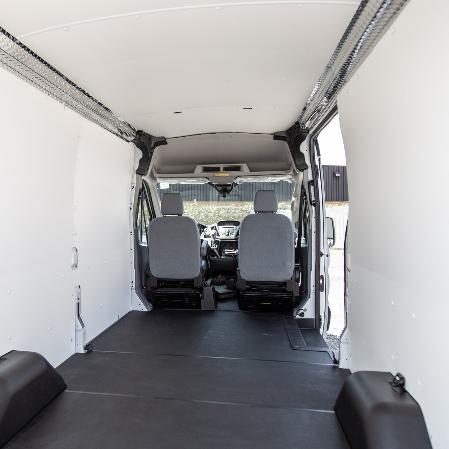 Cargo Van Interior showing installed DuraTherm Ceiling Liner Kit in White