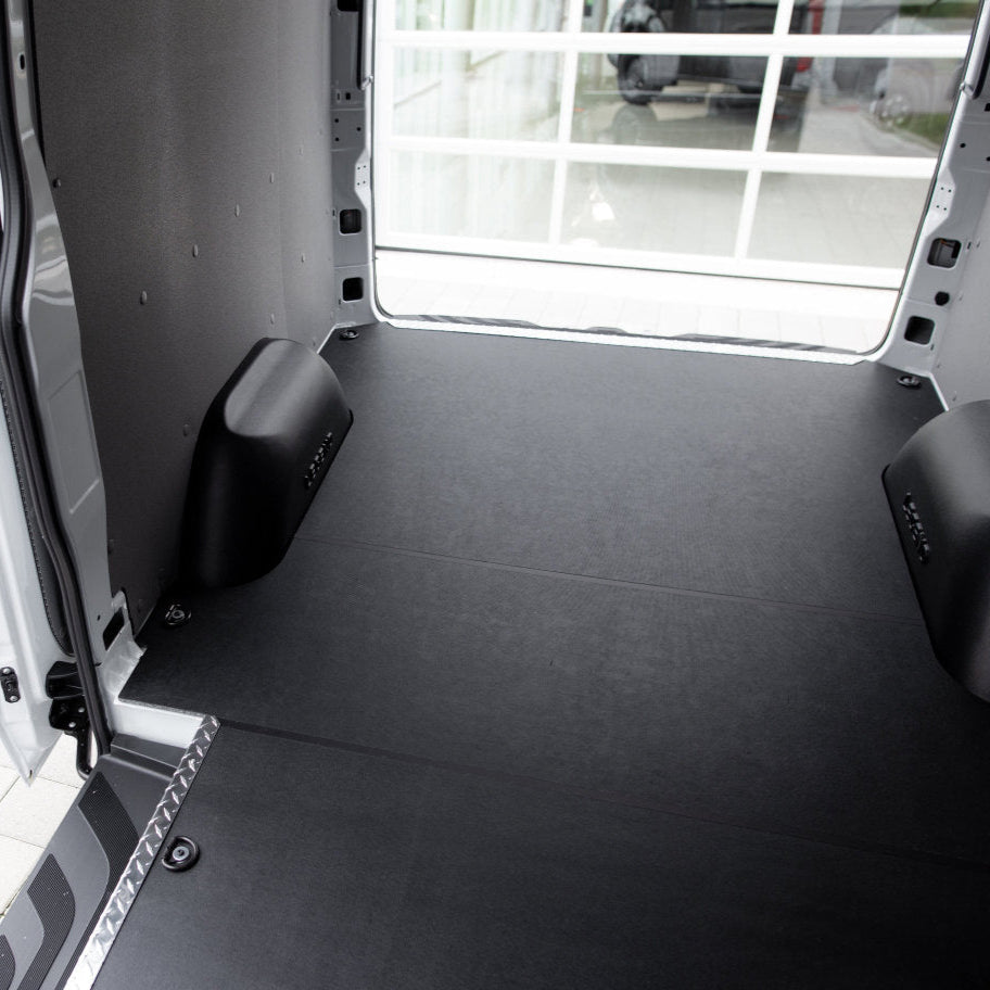 Inside view of a Mercedes Sprinter with StabiliGrip Flooring and Aluminum Sills installed