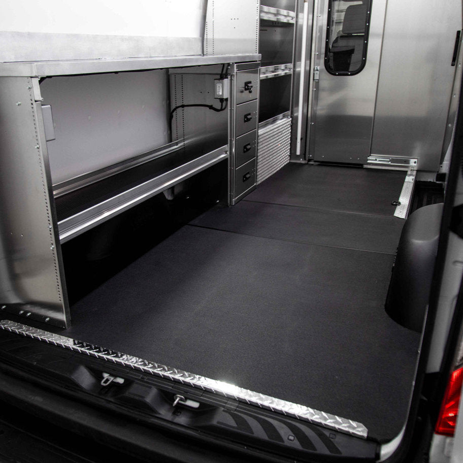 StabiliGrip Flooring in van interior with aluminum sills attached